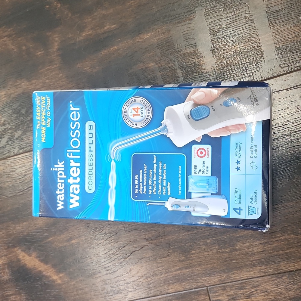 WATERPIK cordless plus water flosser with 7 tips used with original box